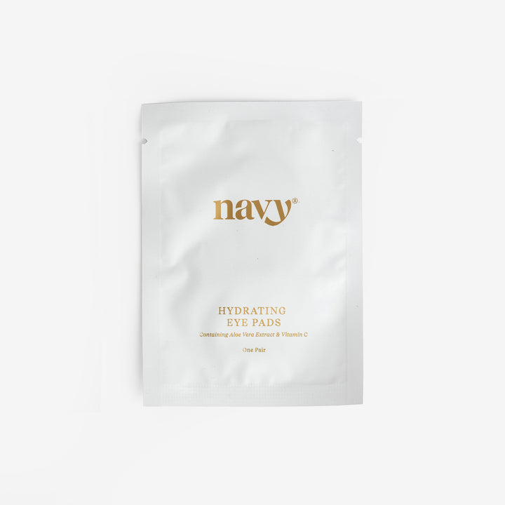 A sealed, single-use eye pad treatment pouch with the brand name 'navy' printed on it.