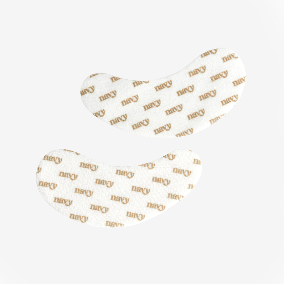 pair of eyepad treatment pads with navy logo