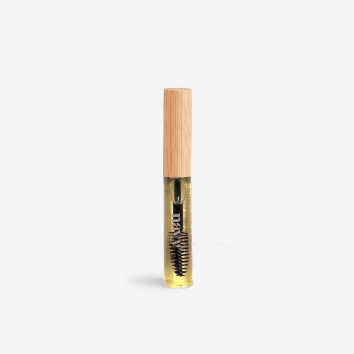 A bottle of Conditioning Lash & Brow Serum with a brush applicator. Supports tihicker, stronger lashes