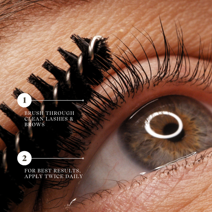 A bottle of Conditioning Lash & Brow Serum with a brush applicator. Supports tihicker, stronger lashes. Plant based oils