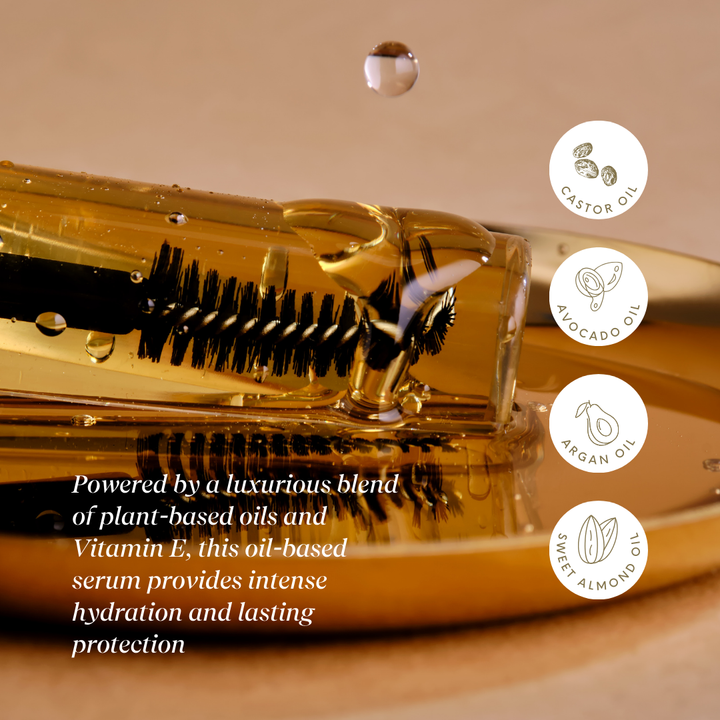 A bottle of Conditioning Lash & Brow Serum with a brush applicator. Supports tihicker, stronger lashes.Vegan. Ethically Sourced. Cruelty Free