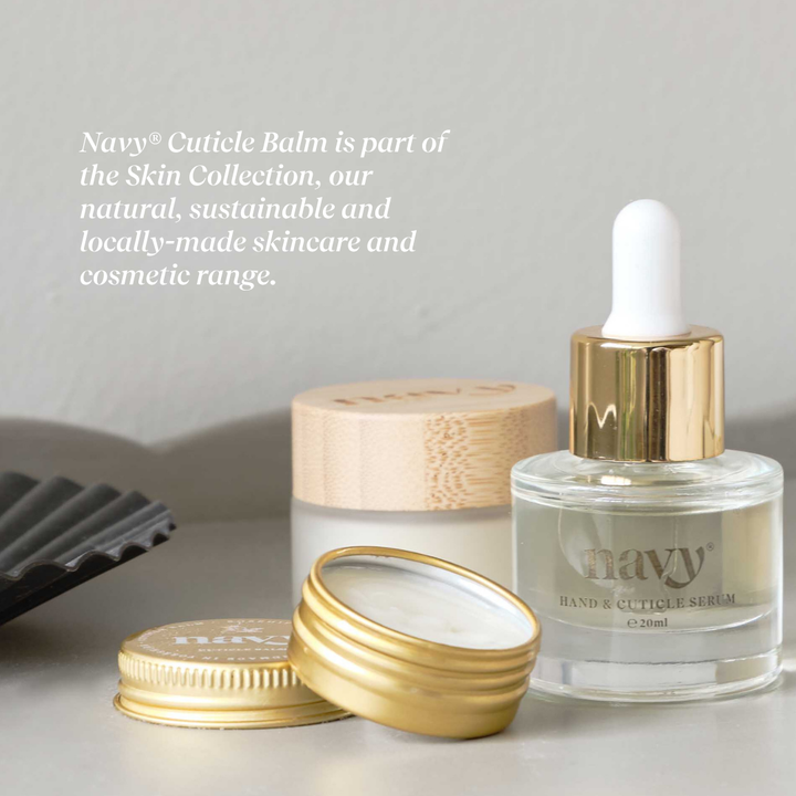 Navy cuticle balm and serum on a neutral background with text about the brand.