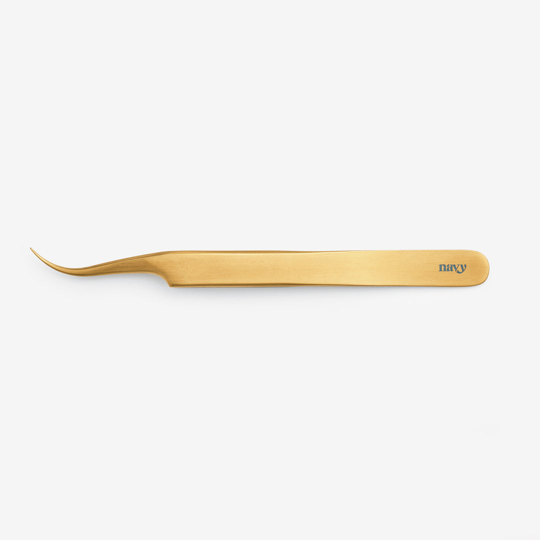 A professional curved Gold tweezer