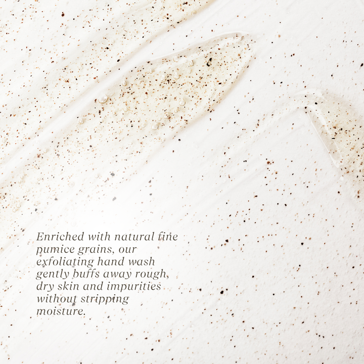 Exfoliating hand wash with natural pumice grains on a white background