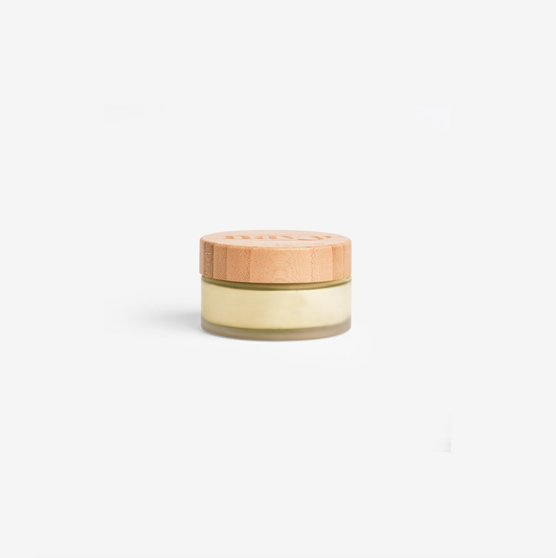 Botanical lip balm in Eucalyptus Mint scent in small round pot. Infused with plant-derived oils