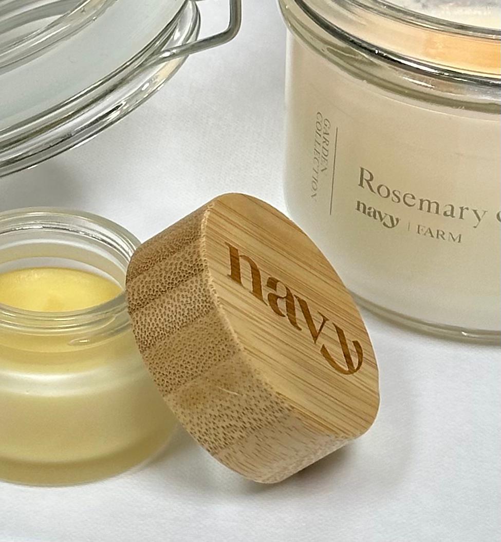Botanical lip balm in Eucalyptus Mint scent in small round pot. Infused with plant-derived oils