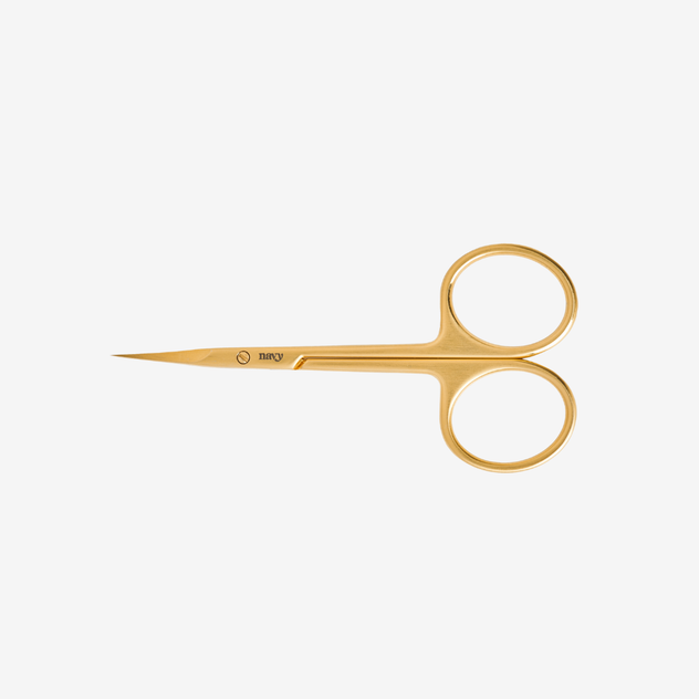 Pair of gold embroidery scissors on a white background