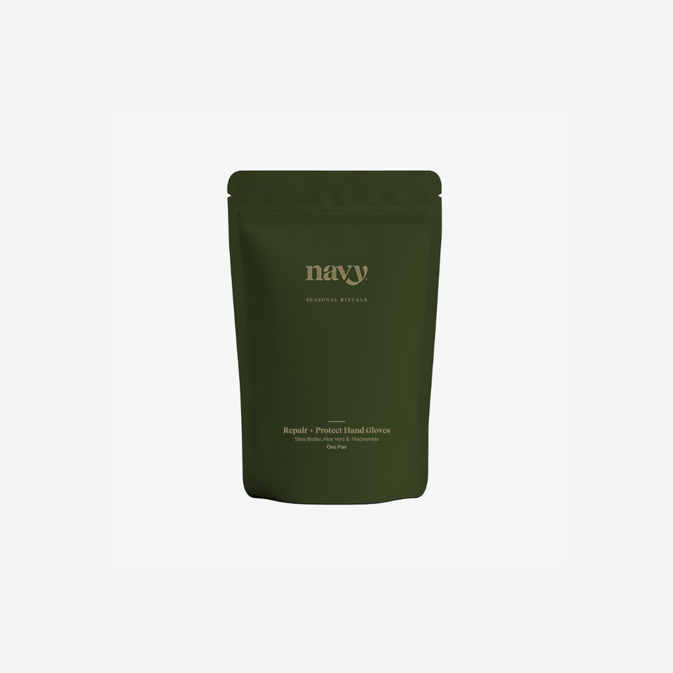 A dark olive green stand-up pouch package with gold text reading 'navy' and smaller product text below, centered on a very light gray background.
