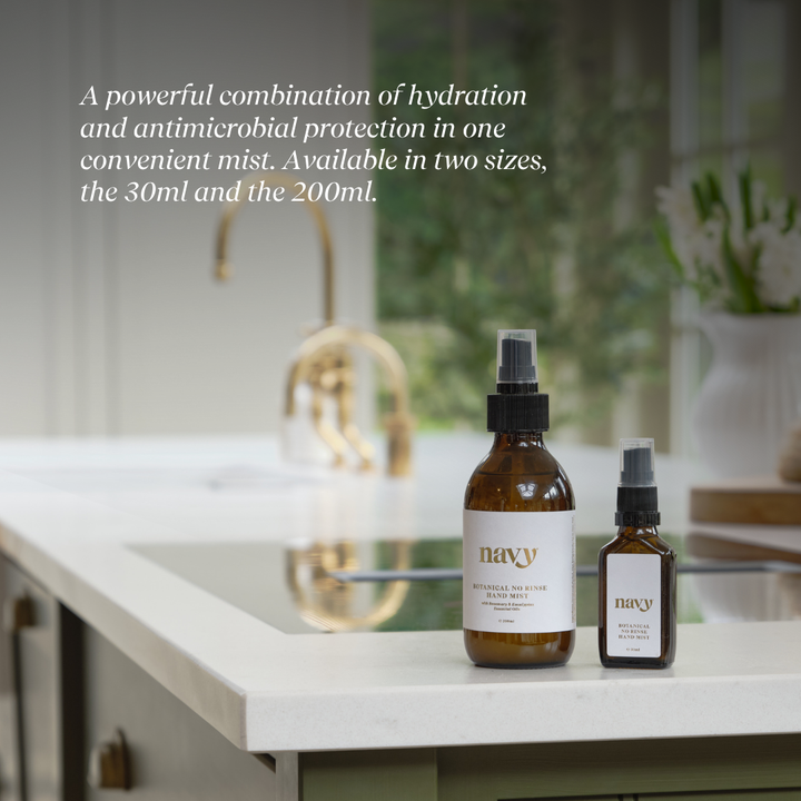 Hand Mist on kitchen countertops with information. 
A powerful combination of hydration and antimicrobal protection in one convenient mist. Available in two sizes, the 30ml and then 200ml. 