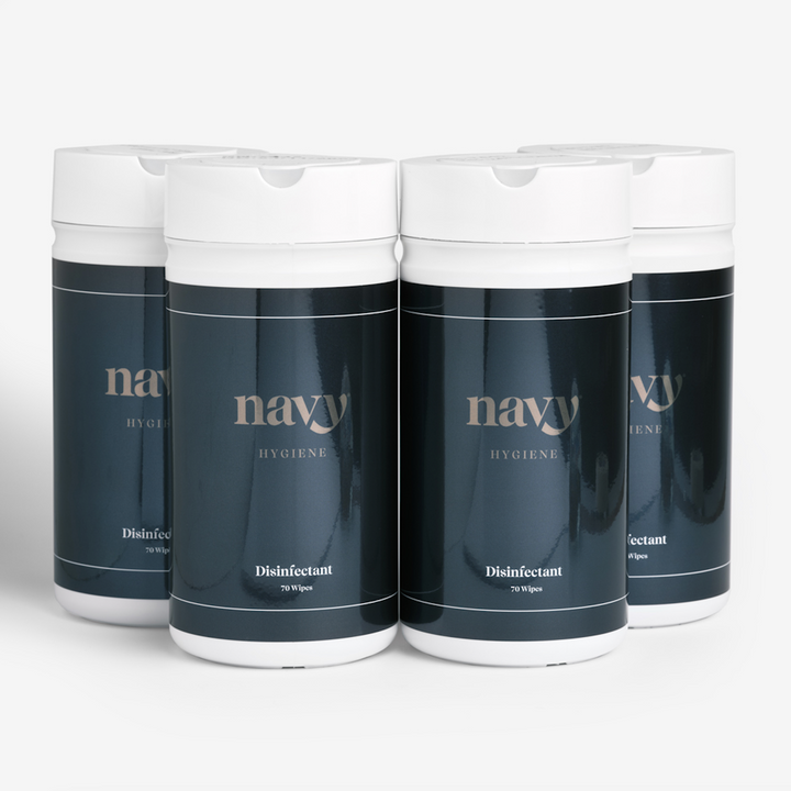 Four bottles of Navy branded salon hygiene wipes, four labeled as 'Detergent Wipes' and four as 'Disinfecting Wipes'.
