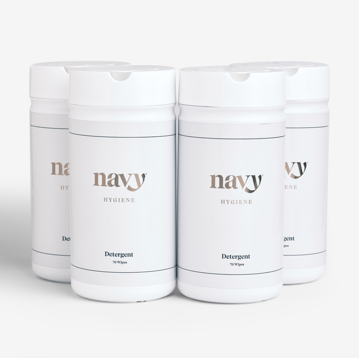 Four bottles of Navy branded salon hygiene wipes, four labeled as 'Detergent Wipes' and four  as 'Disinfecting Wipes'.