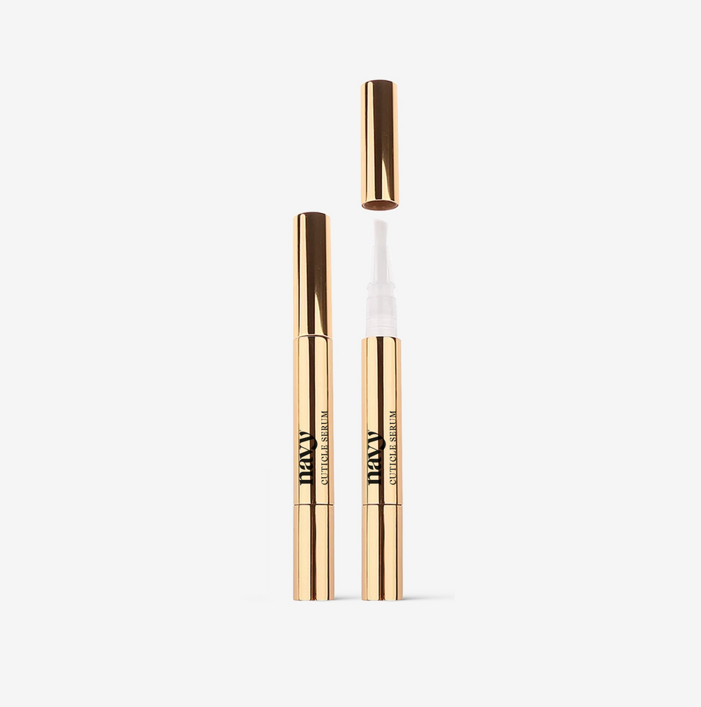 A gold pen-style container with a cuticle serum applicator, navy 
