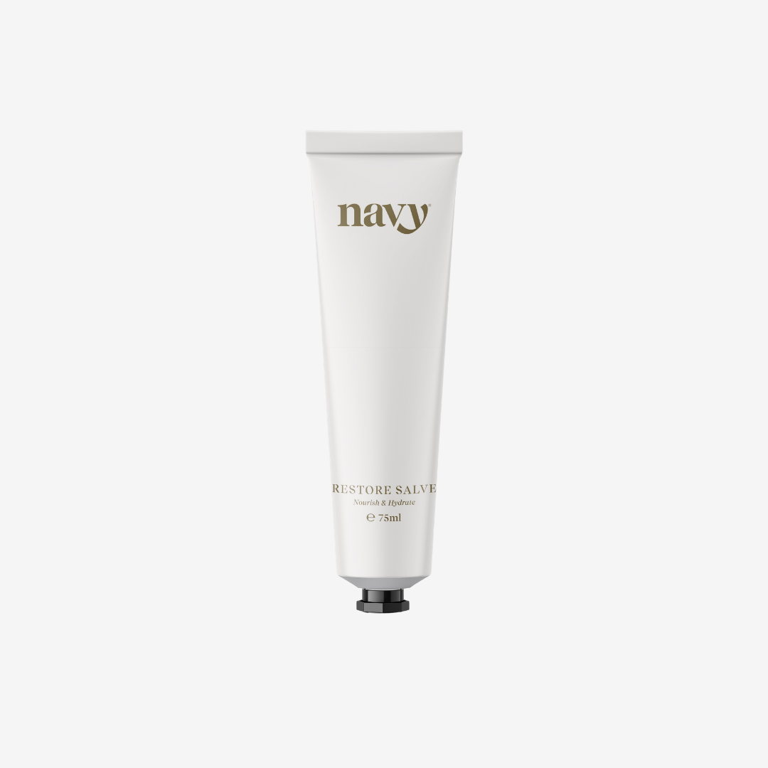 White tube of 'navy' brand salve on a white background