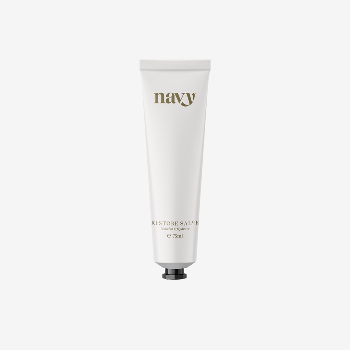 White tube of 'navy' brand salve on a white background