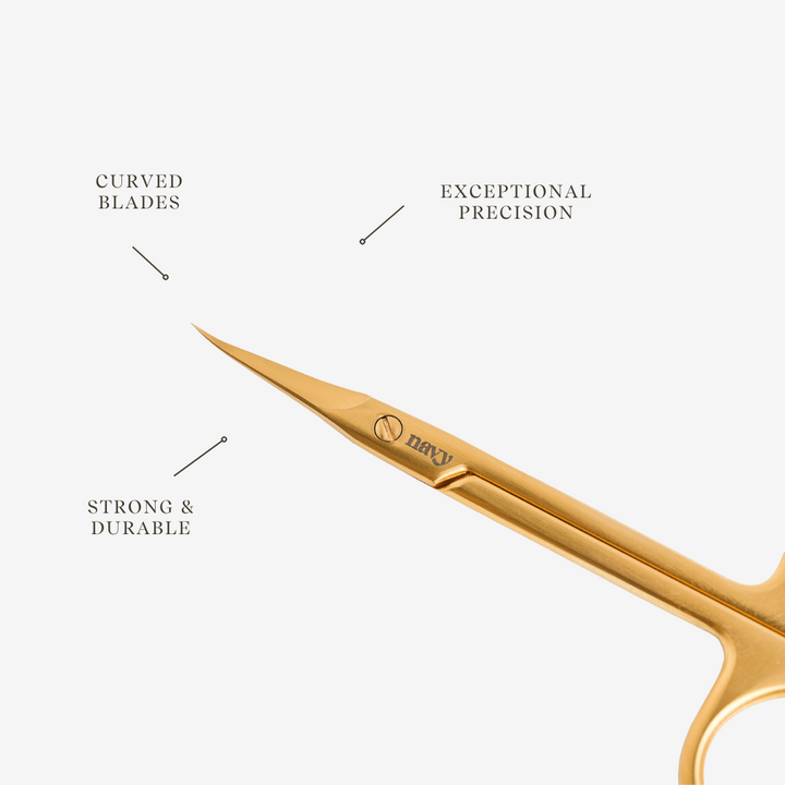Gold scissors with text highlighting features on a white background
