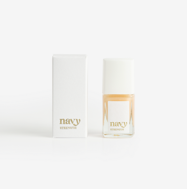 A bottle of Navy Strength nail treatment polish next to its packaging box, both with the brand name visible.