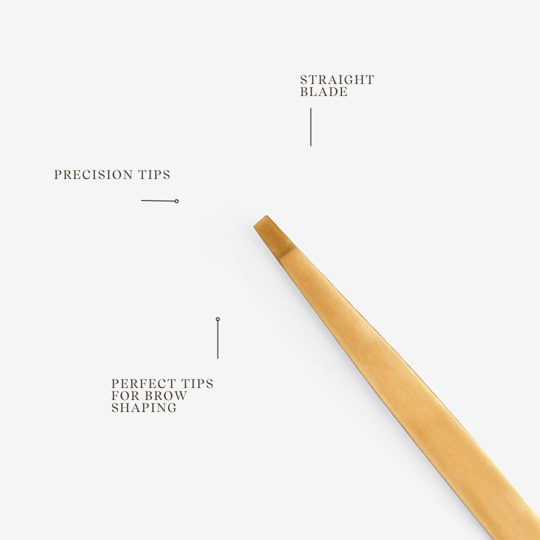 Gold straight blade for brow shaping on a white background