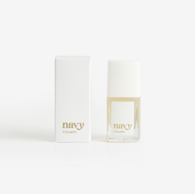 A nail treatment product from Navy Professional, featuring a small bottle of the vitamin-rich formula next to its packaging box, both with the brand name 'navy' printed on them.