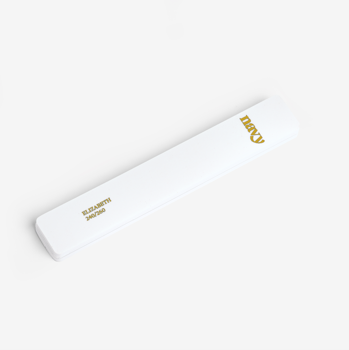 White power bank with gold text on a white background