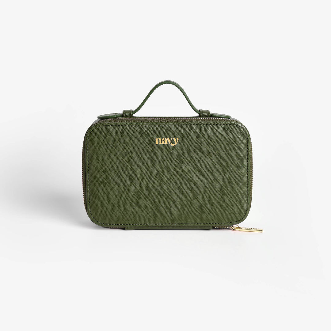 Green travel case with 'navy' branding on a white background