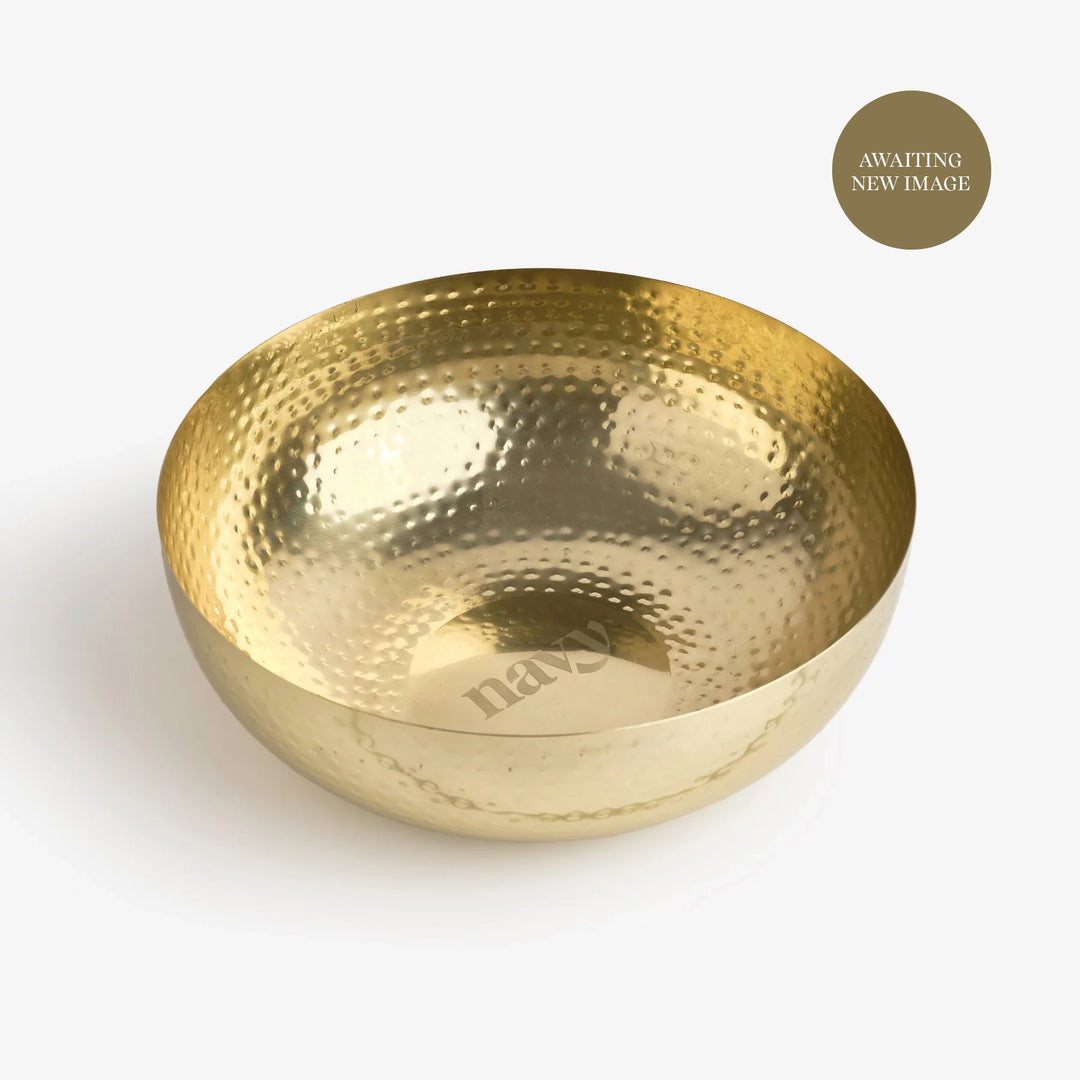 A gold pedicure bowl with a hammered finish displayed on a white background.