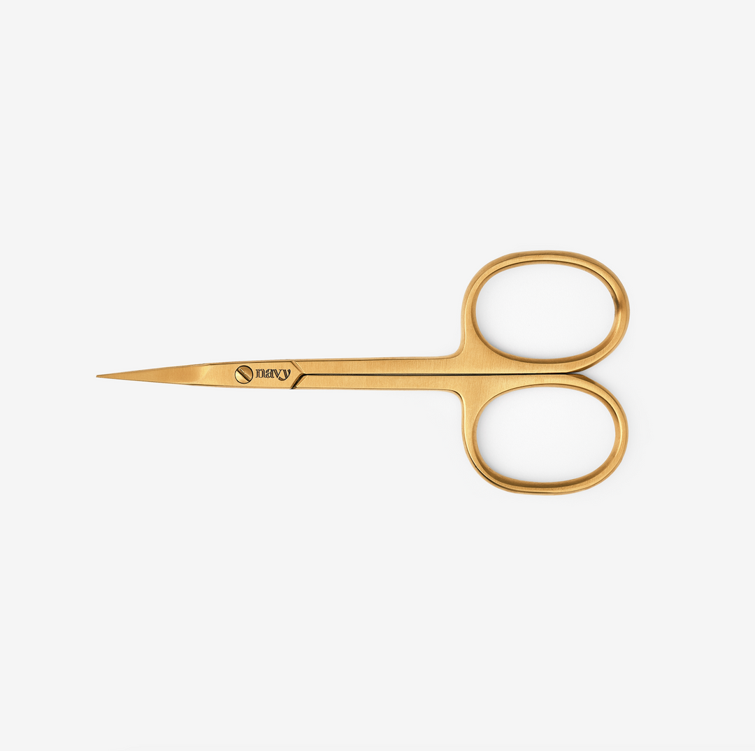 gold straight scissors with pointed tips.
